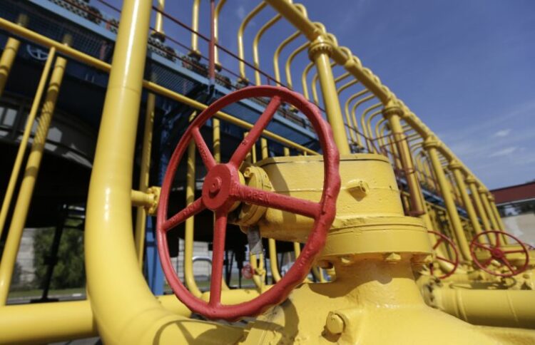 Gas pipes are photographed at the gas compressor station in Velke Kapusany, Slovakia, Tuesday, Sept. 2, 2014. Slovakia has opened a reverse gas pipeline that will get to Ukraine up to 10 billion cubic meters (353 billion cubic feet) of natural gas per year. (AP Photo/Petr David Josek)