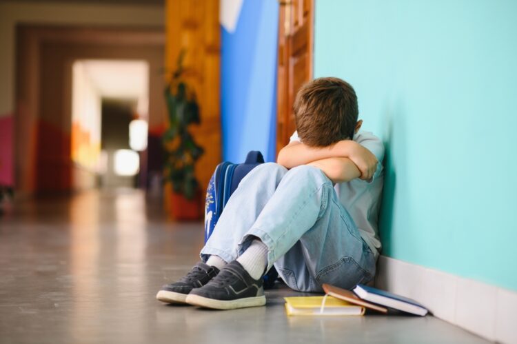 Little,Boy,Sitting,Alone,On,Floor,After,Suffering,An,Act